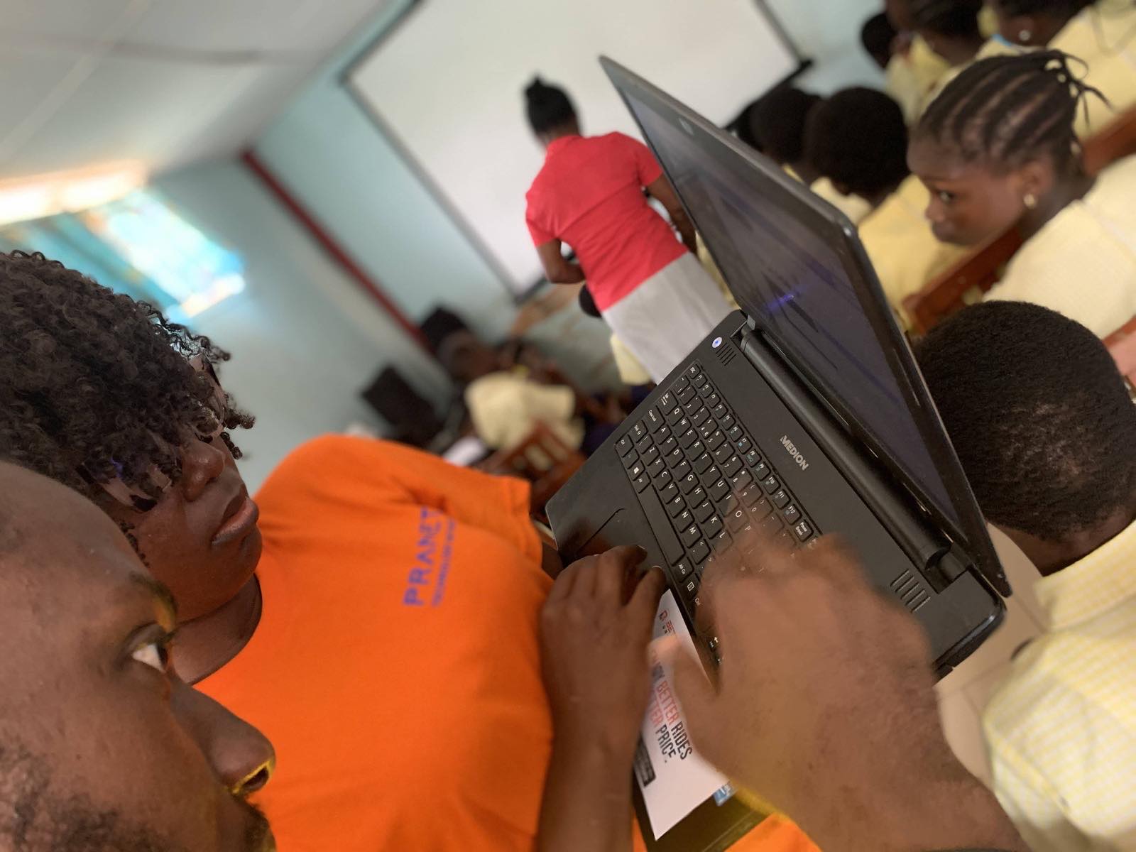 An educator working through a lesson with her students