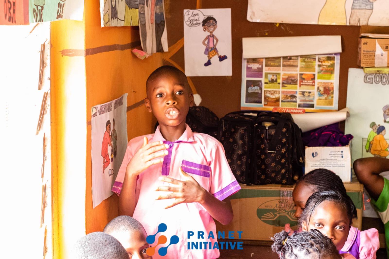 A pupil standing to speak in class