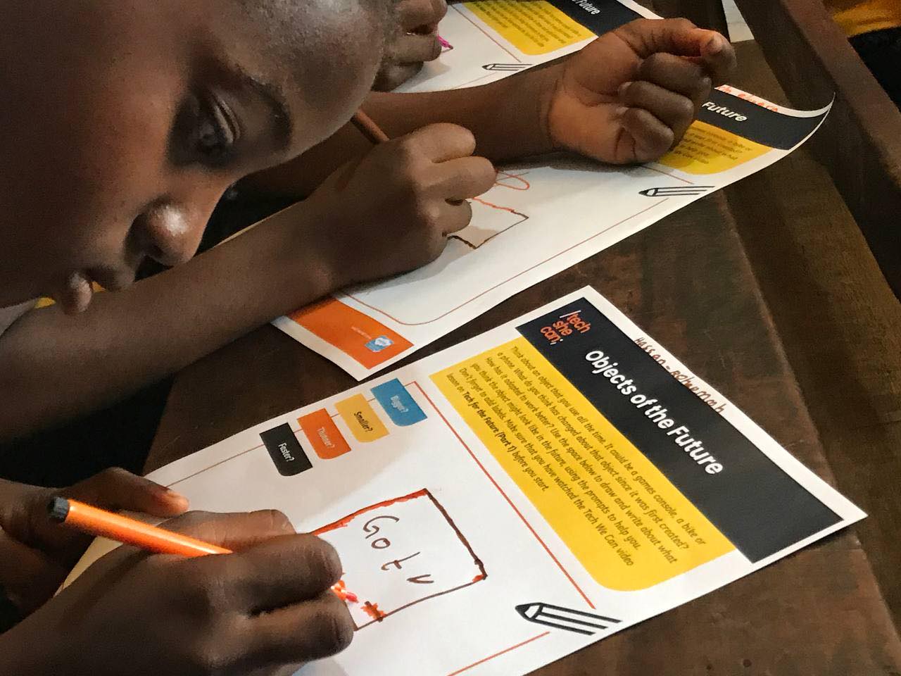 A pupil filling in a worksheet